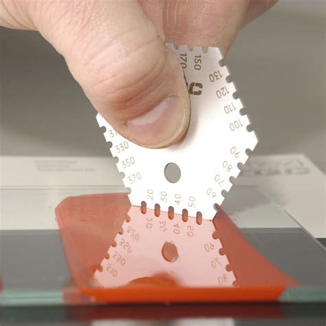 measuring wet film paint thickness|wet film thickness gauge comb.